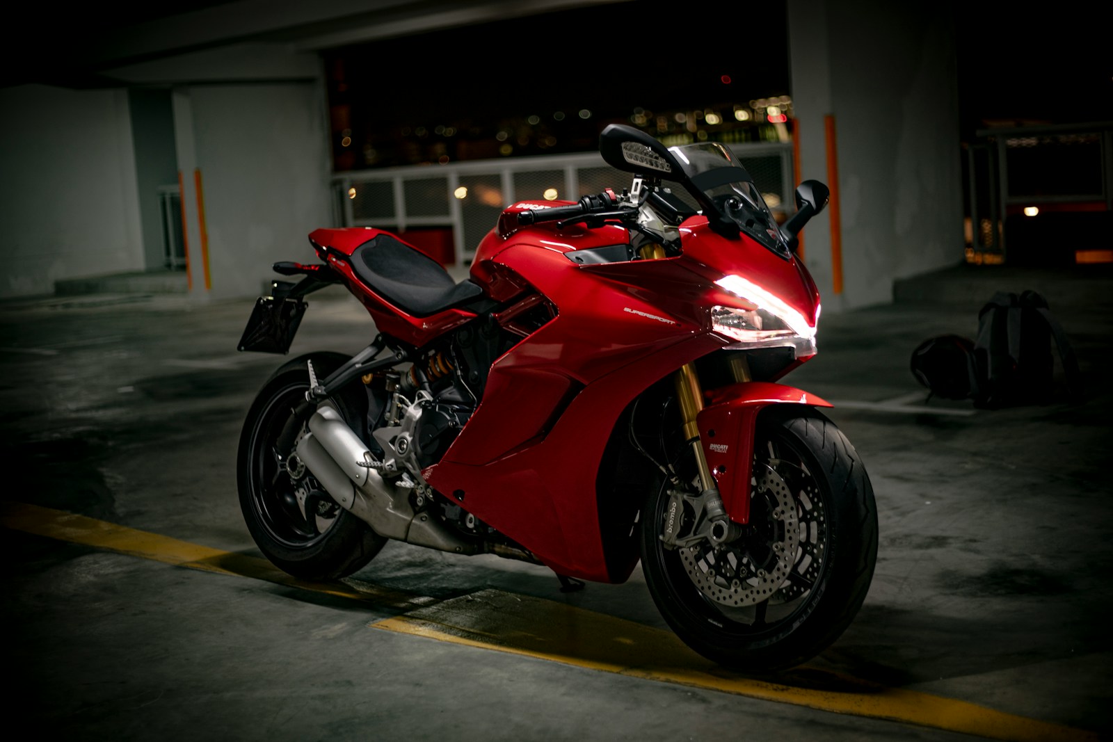 red and black sports bike motorcycle