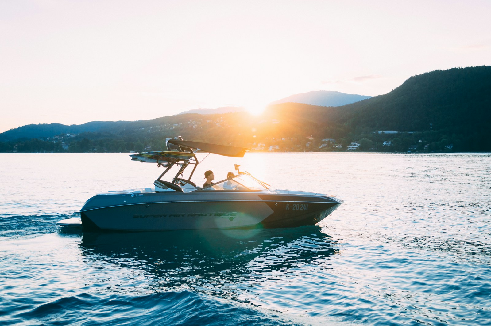 photo of people riding power boat, boat